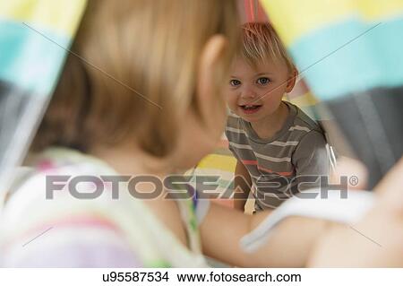 Friends (2-3) sharing tent View Large Photo Image Picture - Friends (2-3) sharing tent. Fotosearch