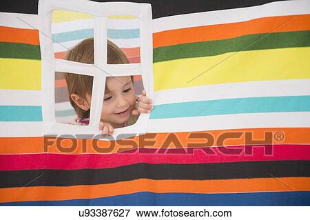 Girl (2-3) looking out window View Large Photo Image Stock Photo - Girl (2-3) looking out window. Fotosearch