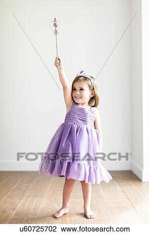 Stock Image - Girl (4-5) in princess costume. Fotosearch