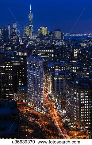Stock Image - High angle view of city at night. Fotosearch