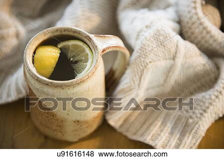 Stock Photo - Hot tea with lemon slices. Fotosearch