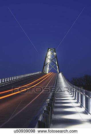 Illuminated bridge at dusk View Large Photo Image Stock Photo - Illuminated bridge at dusk. Fotosearch
