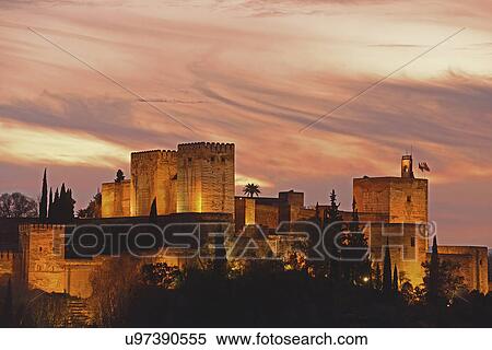 "Illuminated castle at dusk, pastel colored clouds in sky" View Large Photo Image Stock Photography - "Illuminated castle at dusk, pastel colored clouds in sky". Fotosearch