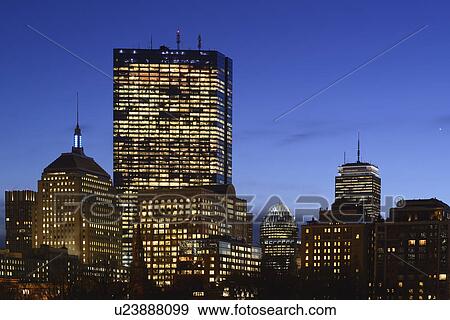 Illuminated office buildings at dusk View Large Photo Image Stock Photo - Illuminated office buildings at dusk. Fotosearch