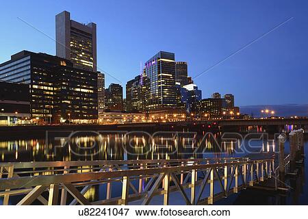 Stock Photo - Illuminated waterfront at dusk. Fotosearch