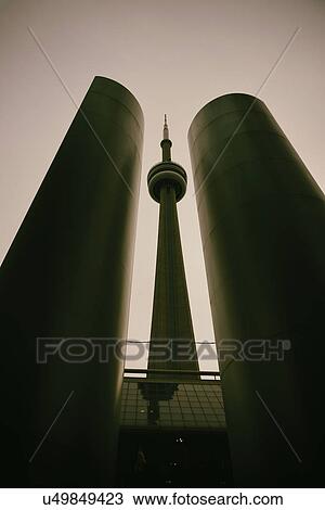 "Low angle, symmetrical view of built structure and communications tower, tinted image" View Large Photo Image Stock Image - "Low angle, symmetrical view of built structure and communications tower, tinted image". Fotosearch