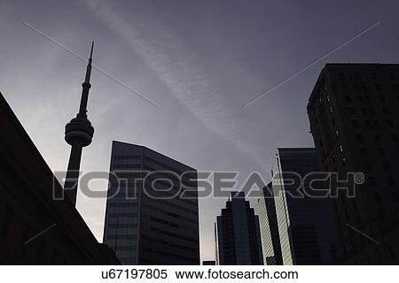 Low angle view of city architecture and communications tower View Large Photo Image Stock Photography - Low angle view of city architecture and communications tower. Fotosearch