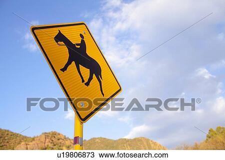 Stock Image - Low angle view of road sign. Fotosearch