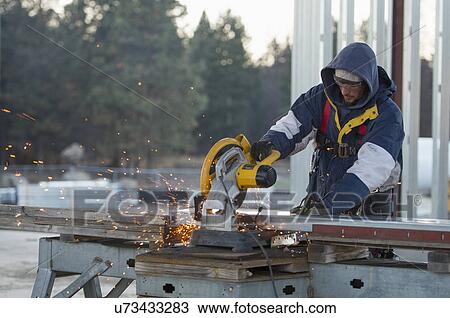 Man cutting steel bar View Large Photo Image Stock Image - Man cutting steel bar. Fotosearch