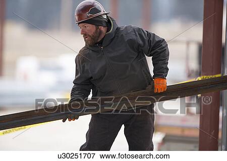 Man lifting steel bar View Large Photo Image Stock Photo - Man lifting steel bar. Fotosearch