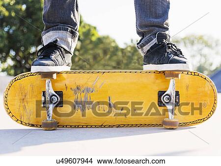 Man skateboarding in skatepark View Large Photo Image Picture - Man skateboarding in skatepark. Fotosearch