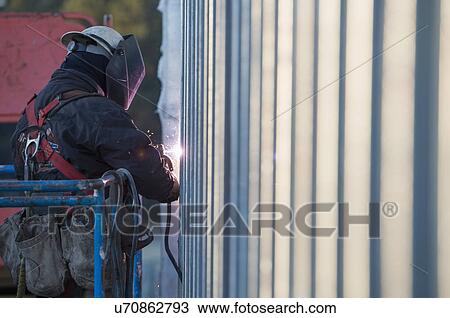Man welding steel bar View Large Photo Image Stock Image - Man welding steel bar. Fotosearch
