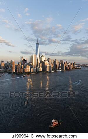 Manhattan skyline at sunset View Large Photo Image Stock Image - Manhattan skyline at sunset. Fotosearch