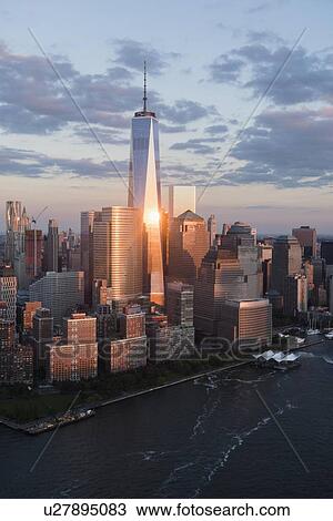 Stock Image - Manhattan skyline at sunset. Fotosearch