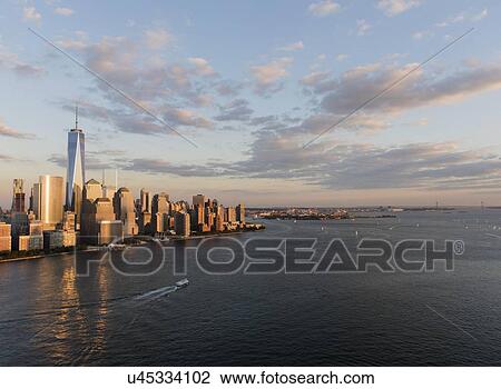 Manhattan skyline at sunset View Large Photo Image Stock Image - Manhattan skyline at sunset. Fotosearch