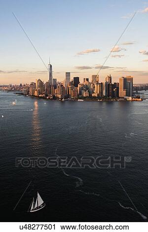 Manhattan skyline at sunset View Large Photo Image Stock Image - Manhattan skyline at sunset. Fotosearch
