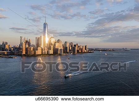 Stock Image - Manhattan skyline at sunset. Fotosearch