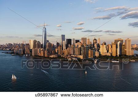 Manhattan skyline at sunset View Large Photo Image Stock Photo - Manhattan skyline at sunset. Fotosearch
