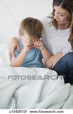 Mother consolling son (6-7) View Large Photo Image Stock Image - Mother consolling son (6-7) . Fotosearch