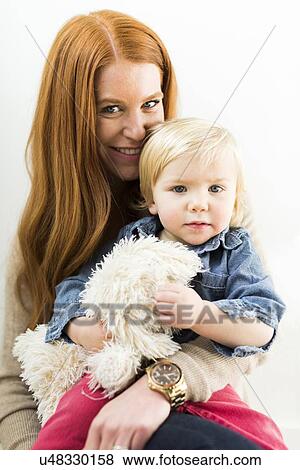 Mother holding son (2-3) View Large Photo Image Stock Photo - Mother holding son (2-3). Fotosearch