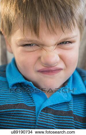 Portrait of frustrated boy (6-7) View Large Photo Image Picture - Portrait of frustrated boy (6-7). Fotosearch