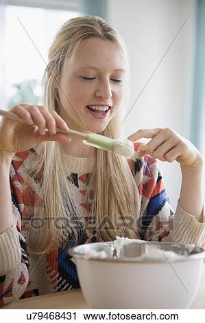 Portrait of woman baking cake View Large Photo Image Stock Image - Portrait of woman baking cake. Fotosearch