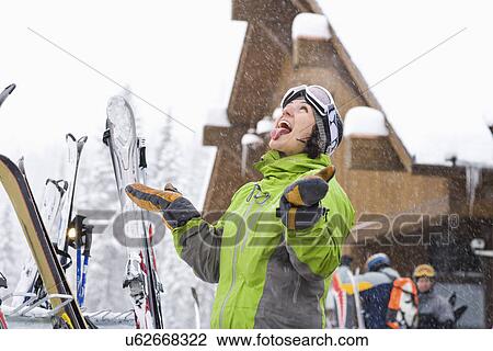Portrait of woman enjoying snow View Large Photo Image Stock Image - Portrait of woman enjoying snow. Fotosearch
