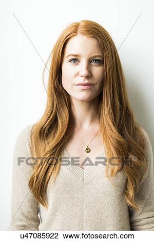 Portrait of woman with long red hair View Large Photo Image Stock Image - Portrait of woman with long red hair. Fotosearch