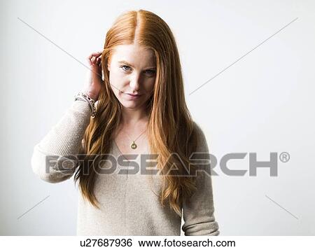 Portrait of woman with long red hair View Large Photo Image Stock Photograph - Portrait of woman with long red hair. Fotosearch