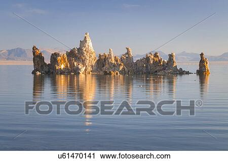 Stock Image - Rock formation in lake. Fotosearch