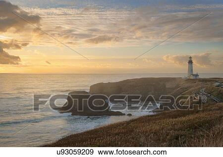 Scenic view of lighthouse at sunset View Large Photo Image Stock Photo - Scenic view of lighthouse at sunset. Fotosearch