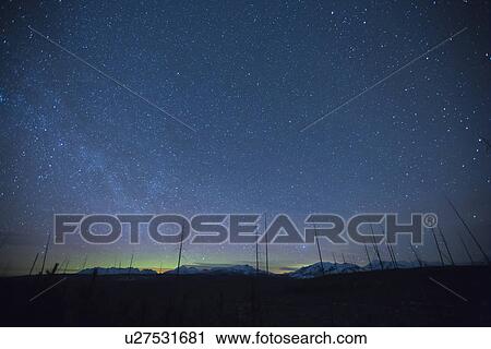Scenic view of night sky with aurora borealis View Large Photo Image Stock Image - Scenic view of night sky with aurora borealis. Fotosearch