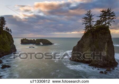 Scenic view of seascape at sunset View Large Photo Image Stock Image - Scenic view of seascape at sunset. Fotosearch