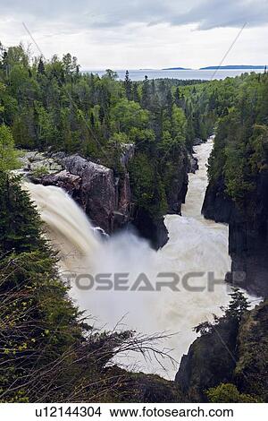 Scenic view of waterfall View Large Photo Image Picture - Scenic view of waterfall. Fotosearch