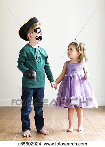 "Siblings (2-3, 4-5) dressed up as pirate and princess" View Large Photo Image Picture - "Siblings (2-3, 4-5) dressed up as pirate and princess". Fotosearch