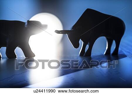 Silhouettes of figurines of bull and bear in spot light View Large Photo Image Stock Image - Silhouettes of figurines of bull and bear in spot light. Fotosearch