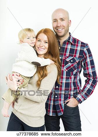 Smiling parents with son (2-3) View Large Photo Image Stock Photography - Smiling parents with son (2-3). Fotosearch