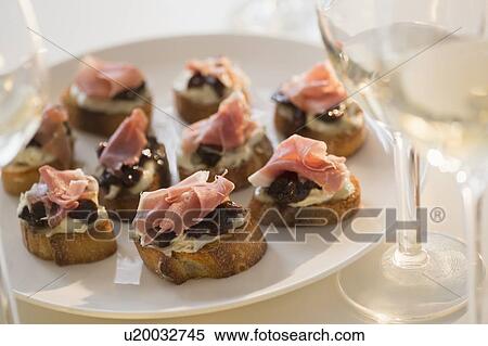Studio Shot of canapes on plate View Large Photo Image Stock Photography - Studio Shot of canapes on plate. Fotosearch