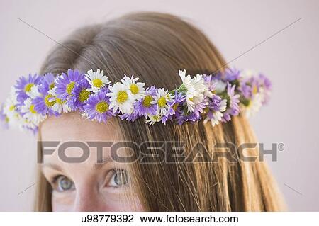 Studio shot of woman in wreath View Large Photo Image Stock Image - Studio shot of woman in wreath. Fotosearch