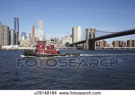"View of boat, Brooklyn bridge and cityscape" View Large Photo Image Picture - "View of boat, Brooklyn bridge and cityscape". Fotosearch