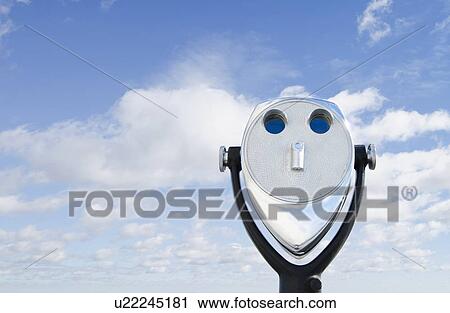 View of coin-operated binoculars against sky and clouds View Large Photo Image Stock Image - View of coin-operated binoculars against sky and clouds. Fotosearch
