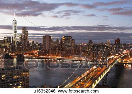 Stock Photograph - View of East River and cityscape. Fotosearch