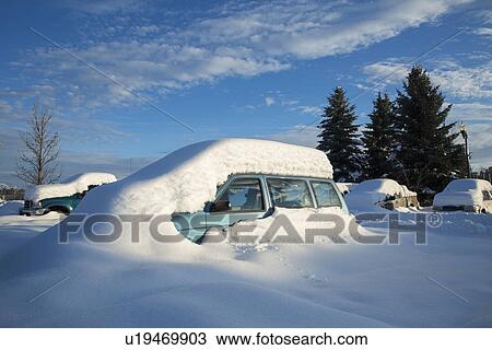 Stock Image - View of snowcapped car. Fotosearch