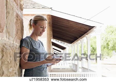 Woman looking at map View Large Photo Image Stock Image - Woman looking at map. Fotosearch