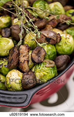Brussels sprouts in dish View Large Photo Image Picture - Brussels sprouts in dish. Fotosearch