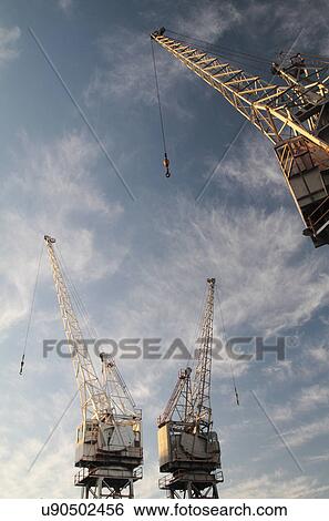 Cranes at Victoria and Albert docks View Large Photo Image Stock Photograph - Cranes at Victoria and Albert docks. Fotosearch