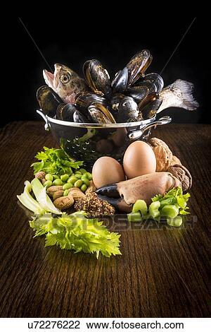 Stock Image - Foods that can all be allergens. Fotosearch