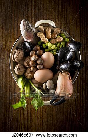 Stock Photo - Foods that can all be allergens. Fotosearch