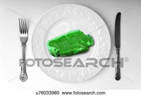Green meat on white plate View Large Photo Image Stock Image - Green meat on white plate. Fotosearch