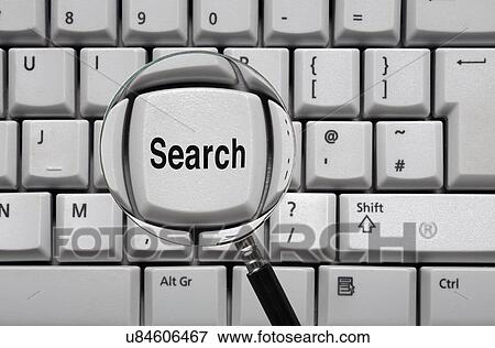 Magnifying glass and search key View Large Photo Image Stock Photo - Magnifying glass and search key. Fotosearch